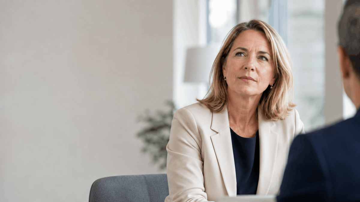 Woman pausing as her mind goes blank under pressure during a conversation